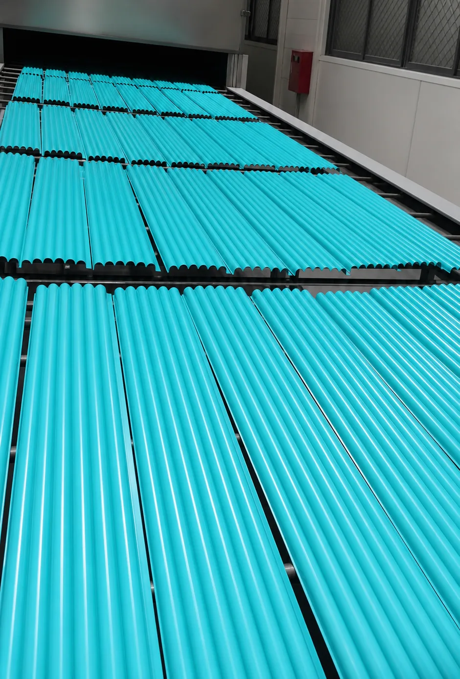 Turquoise powder coated aluminum profiles after color finishing